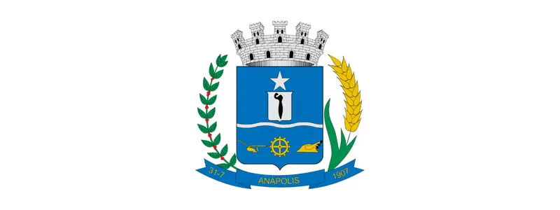 Brasão oficial do município de Anápolis, com escudo azul ao centro, torre de castelo no topo, ramos laterais, estrela, símbolos agrícolas e a inscrição Anápolis com a data de fundação.