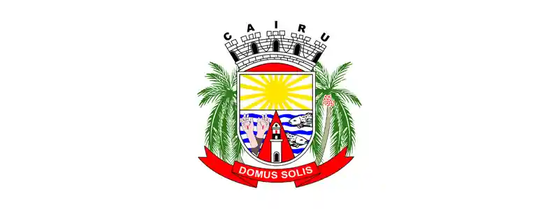 Concurso Cairu BA: 55 vagas e salários de até R$ 3,6 mil 1 Brasão do município de Cairu BA com sol, mar, peixes, igreja, palmeiras laterais e faixa vermelha com o lema Domus Solis.