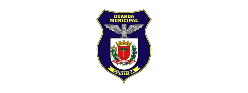 GCM Curitiba abre concurso com 100 vagas p/ Guarda Municipal 1 Brasão da Guarda Municipal de Curitiba com escudo azul, brasão central da cidade e uma águia prateada no topo