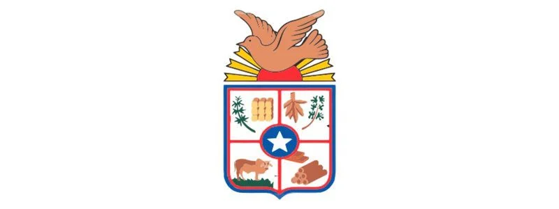 Juruti/PA abre concurso com 1.263 vagas de até R$ 5,5 mil 1 Brasão do município de Juruti, localizado no estado do Pará, com uma pomba vermelha voando acima de um escudo dividido em quatro quadrantes com símbolos regionais.
