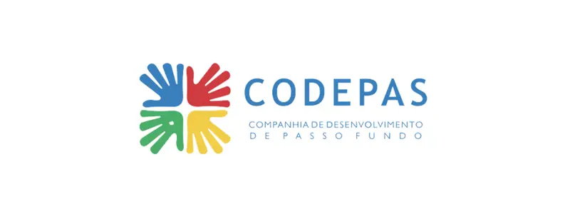 Logotipo da CODEPAS (Companhia de Desenvolvimento de Passo Fundo), com um símbolo composto por quatro mãos coloridas (azul, vermelho, verde e amarelo) que formam uma cruz central, seguido pelo nome da empresa em letras azuis.