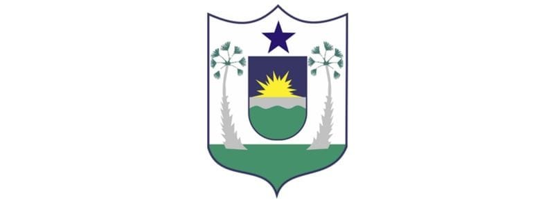 Limoeiro do Norte CE abre seleção com 41 vagas p/ ACS e ACE 1 Brasão do município de Limoeiro do Norte CE, com sol nascente sobre colinas verdes, ladeado por palmeiras e estrela azul no topo.
