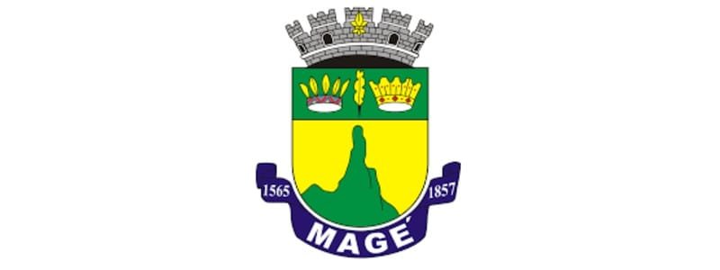 Magé/RJ abre concurso com 20 vagas de R$ 5,6 mil para Fiscal 1 Brasão oficial da Prefeitura de Magé com coroa cinza, escudo verde e amarelo, três coroas na parte superior e uma faixa azul com os anos 1565 e 1857.
