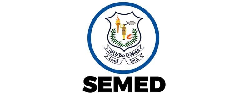 SEMED Paço do Lumiar MA abre 119 vagas de até R$ 5,8 mil 1 Logo da SEMED Paço do Lumiar com escudo central, símbolos educacionais e vegetais, acompanhado do texto “SEMED” em negrito abaixo.
