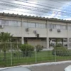 Processo seletivo Amélia Rodrigues BA com fachada da Prefeitura Municipal e área ajardinada